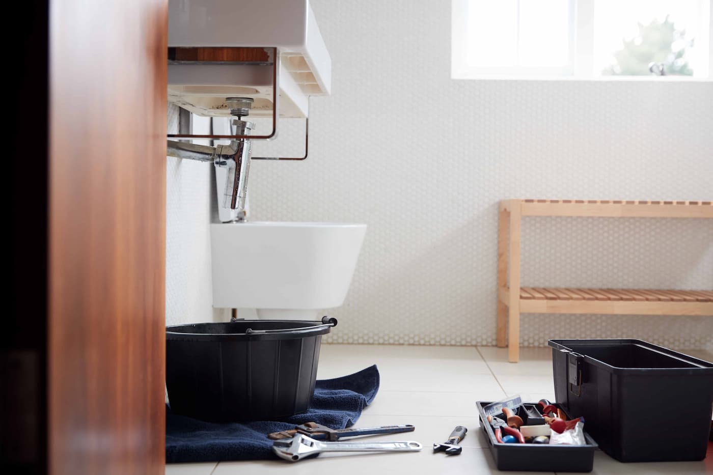 Plumbers tool box in the bathroom 